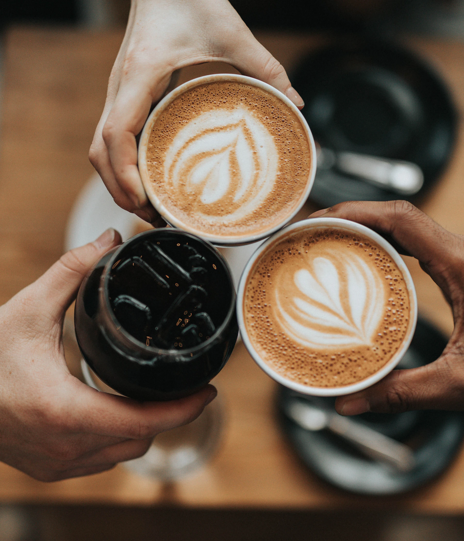 A cup of coffee with soft light and warm neutral tones